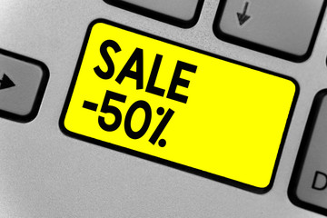 Writing note showing Sale 50. Business photo showcasing A promo price of an item at 50 percent...
