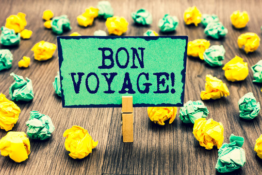 Text sign showing Bon Voyage. Conceptual photo used express good wishes to someone about set off on journey Clothespin holding green note paper crumpled papers several tries mistakes