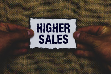 Handwriting text Higher Sales. Concept meaning The average sold products and services of a company...