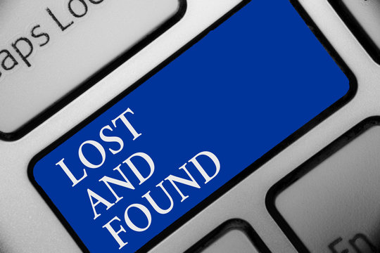 Text sign showing Lost And Found. Conceptual photo Place where you can find forgotten things Search service Keyboard blue key Intention create computer computing reflection document