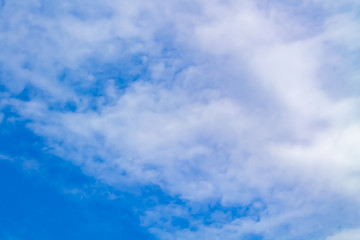 White and lush clouds in the blue sky