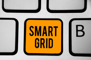 Text sign showing Smart Grid. Conceptual photo includes of operational and energy measures including meters Keyboard orange key Intention create computer computing reflection document