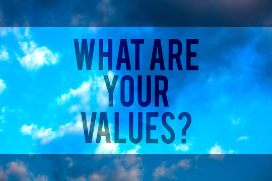 Handwriting text What Are Your Values question. Concept meaning asking someone about his good qualities Multiline text desktop natural blue sky cloudy background send messages