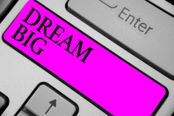 Handwriting text writing Dream Big. Concept meaning To think of something high value that you want to achieve Keyboard purple key Intention create computer computing reflection document