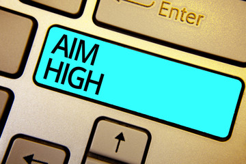 Conceptual hand writing showing Aim High. Business photo showcasing go for best job school or activity Asking someone to dream big Keyboard blue key Intention computing reflection document