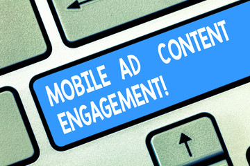 Handwriting text Mobile Ad Content Engagement. Concept meaning Social media advertising promotion strategies Keyboard key Intention to create computer message pressing keypad idea