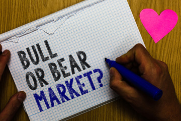 Handwriting text Bull Or Bear Market question. Concept meaning asking someone about his marketing...