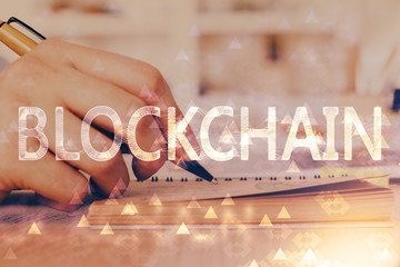 Man's hands working with notes background. Cryptocurrency and finance concept.