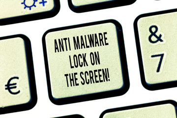 Conceptual hand writing showing Anti Malware Lock On The Screen. Business photo text Security safety against malware hacking Keyboard key Intention to create computer message idea