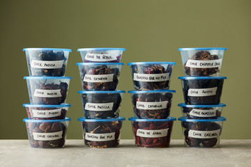 Stacked peppers in small containers