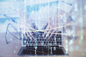 Businessman with computer background with technology theme hologram. Concept of big data. Double exposure.