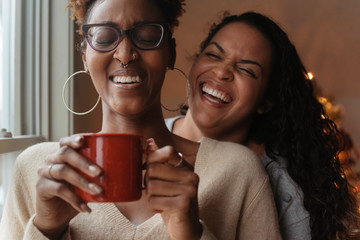 Friends decorating at christmas time