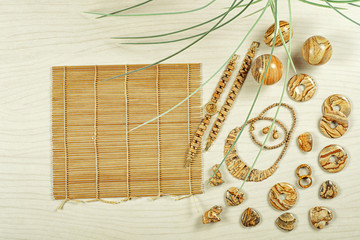 Watches, balls, pendants, bracelets, a necklace made of picture jasper items with bamboo sushi...