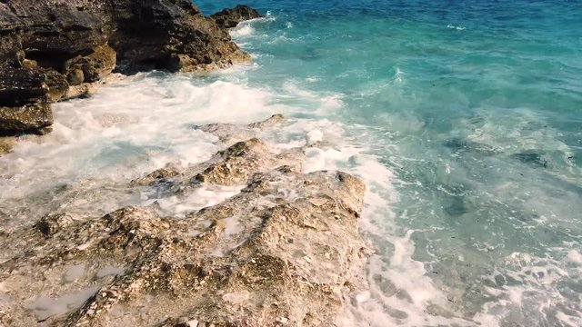Rocky beach and crystal turquoise water of Ionian Sea in Albania. Calm and relaxing view