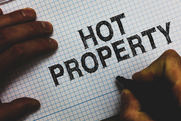 Handwriting text Hot Property. Concept meaning Something which is sought after or is Heavily...