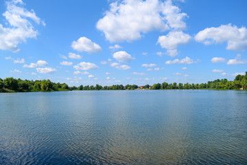 Obraz na płótnie Canvas A large lake in the nature. Summer landscape.
