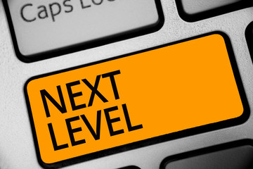 Conceptual hand writing showing Next Level. Business photo showcasing having more than one floor and referring to after current Keyboard orange key computer computing reflection document