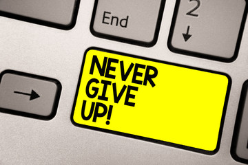 Word writing text Never Give Up. Business concept for Keep trying until you succeed follow your dreams goals Keyboard yellow key Intention create computer computing reflection document