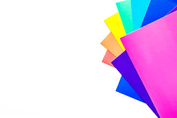 Set of multicolored paper isolated on white background. Copy space for text .