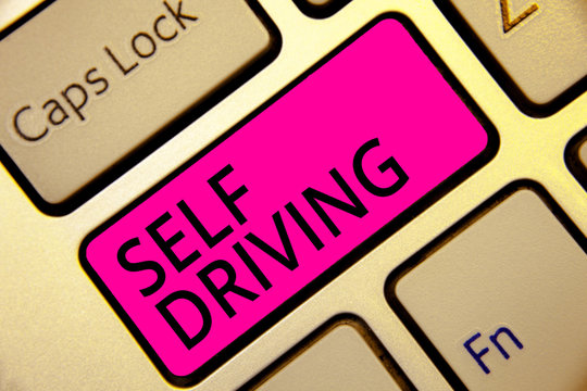 Text sign showing Self Driving. Conceptual photo Autonomous vehicle Ability to navigate without human input Keyboard pink key Intention create computer computing reflection document