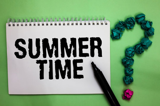 Word writing text Summer Time. Business concept for Longer daylight Tropical season Beach activities Vacation Notebook marker crumpled papers forming question mark green background