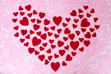 Valentine's Day concept. Red heart paper on pink and white background. Top view with copy space.