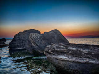 Fototapeta na wymiar Seascape with stones during the sunset