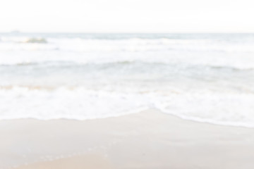 defocused or blurry of empty beach and tropical sea with sky background.