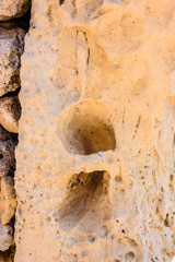 A hole carved into one of the rocks in the ancient megalithic temple of Gigantija, Xaghra, Gozo, Malta. Its purpose is unknown.