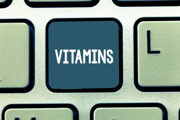 Conceptual hand writing showing Vitamins. Business photo showcasing group of organic compounds which are essential for normal growth Keyboard Intention to create computer message keypad idea