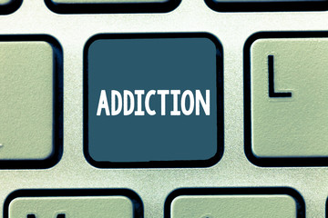 Conceptual hand writing showing Addiction. Business photo showcasing condition of being addicted to particular substance or activity Keyboard Intention to create computer message keypad idea