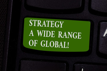 Fototapeta premium Word writing text Strategy A Wide Range Of Global. Business concept for Worldwide communications strategies Keyboard key Intention to create computer message pressing keypad idea