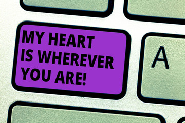Conceptual hand writing showing My Heart Is Wherever You Are. Business photo text Expressing roanalysistic feelings and emotions Keyboard key Intention to create computer message idea