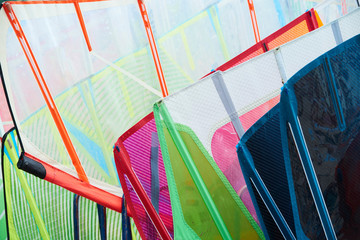 Windsurfing sails storage on a beach watersports facility, selective focus
