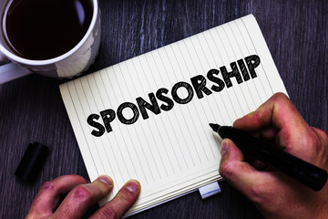 Text sign showing Sponsorship. Conceptual photo Person or company giving financial material support assistance Black coffee white cup paper marker pen thoughts creative black wood
