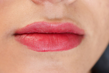 Obraz premium Red lipstick plowed lip, Picture