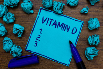Handwriting text Vitamin D. Concept meaning Benefits of sunbeam exposure and certain fat soluble nutriments Cyan paper imagination idea thoughts mistakes several tries marker pen