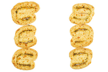 Group of six whole savory cheese palmier copyspace in middle flatlay isolated on white background