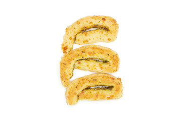 Group of three halves of savory cheese palmier flatlay isolated on white background