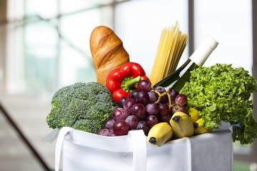 Full shopping  bag, isolated over  background