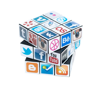 Kiev, Ukraine - February 2, 2013: A Rubik's cube with logotypes of well-known social media brand's. Include Facebook, YouTube, Twitter, Google Plus, Instagram, Vimeo, Flickr, and other logos.