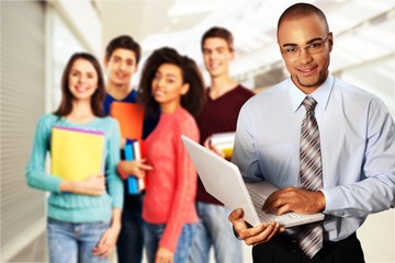 Group of Students with books isolated on light background