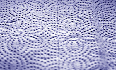 Paper towel surface with blur effect in blue color.