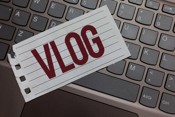 Writing note showing Vlog. Business photo showcasing Entertaining multimedia self broadcasting news...