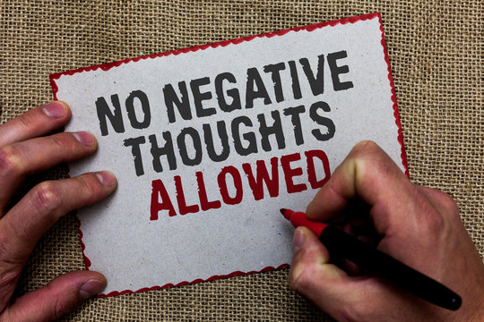 Word writing text No Negative Thoughts Allowed. Business concept for Always positive motivated inspired good vibes On jute ground human hand written some texts on red bordered paper