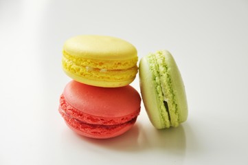 Yellow Red and Green Macaroon on the Light Background in High Resolution