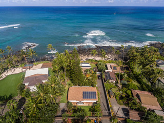 Aerial view of Oceanfront homes on the north shore of Oahu Hawaii - 284198563