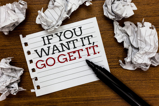 Text sign showing If You Want It, Go Get It. Conceptual photo Make actions to accomplish your goals wishes Paper lumps laid randomly around white notepad touch black pen on woody floor