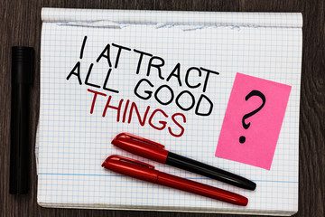 Word writing text I Attract All Good Things. Business concept for Positive attraction law Motivation Affirmation Color pen on written notepad with question mark black marker on woody deck