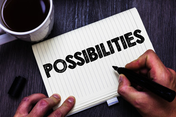 Text sign showing Possibilities. Conceptual photo Things that may happen or be the case State of being possible Black coffee white cup paper marker pen thoughts creative black wood